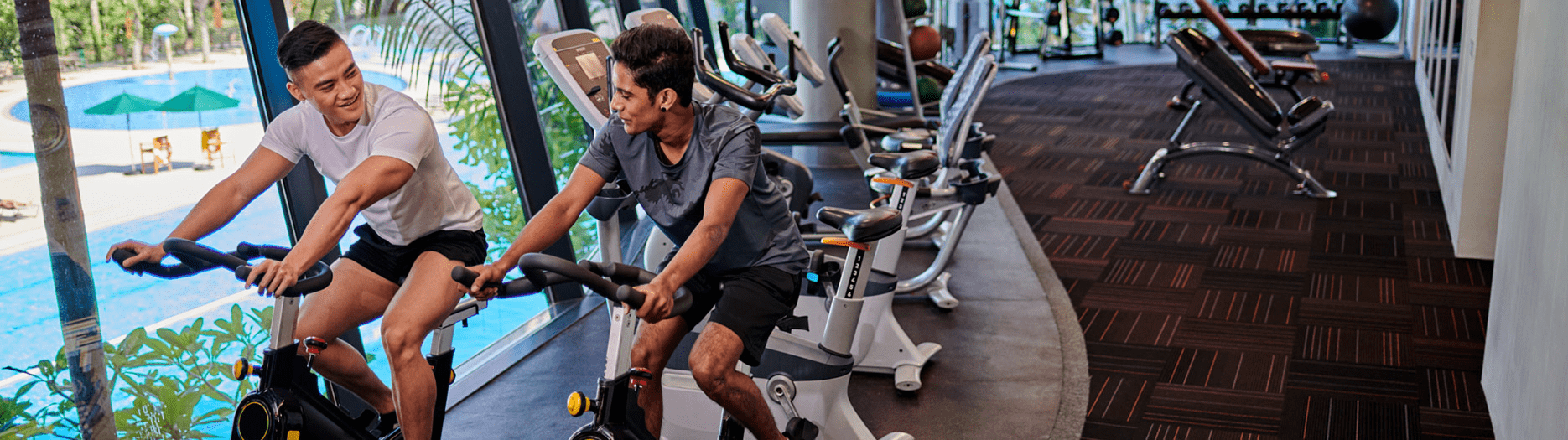 men on exercise bikes